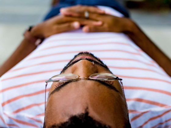 man laying on the ground looking stressed, dear jo Male fertility