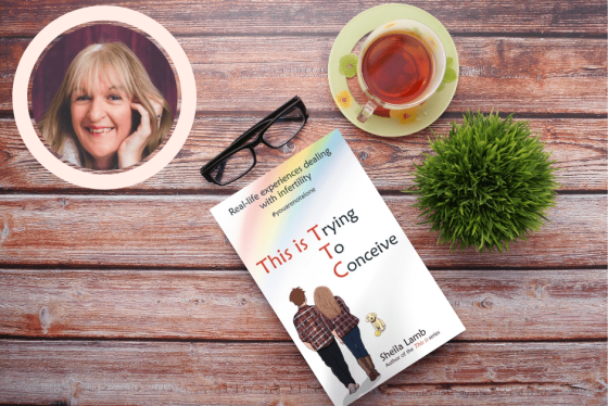 dark wood table with a copy of this is trying to conceive book by sheila lamb, a green plant on the right of the book with a cup of black tea above it, and top left of the page is a circle with the image of Author Sheila Lamb