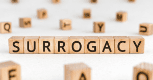 woodern blocks spelling Surrogacy