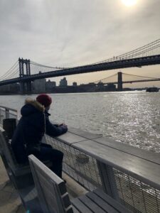 Kevin Button overlooking the Manhattan skyline, contentplating male infertility diganosis