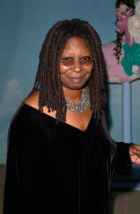 Whoopi Goldberg in a black a dress, illustrating Celebrities with endometriosis