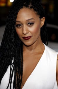 Tia Mowry in a white dressCelebrities with endometriosis
